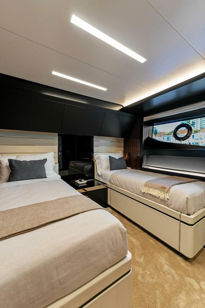 a room with two beds aboard CORSARO SUPER Yacht for Sale