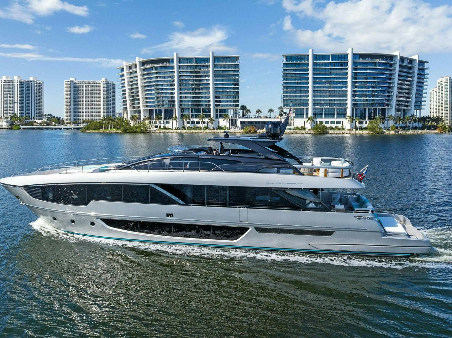 a white yacht in the water aboard CORSARO SUPER Yacht for Sale