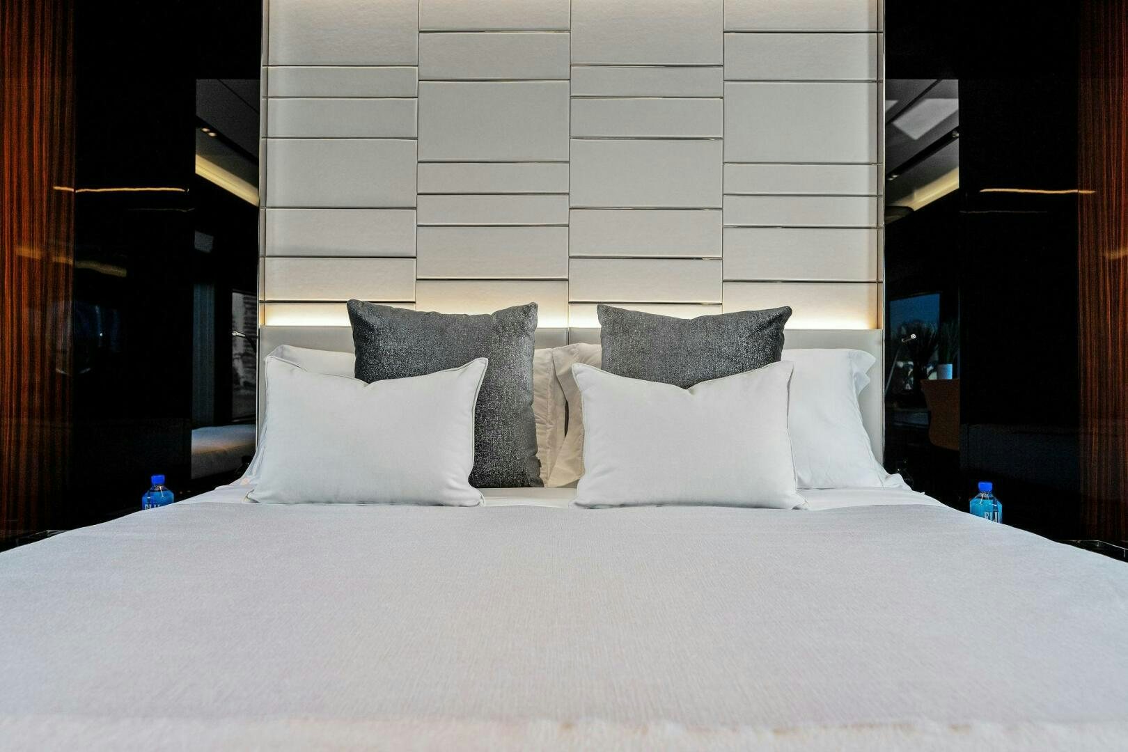 a bed with white sheets aboard CORSARO SUPER Yacht for Sale