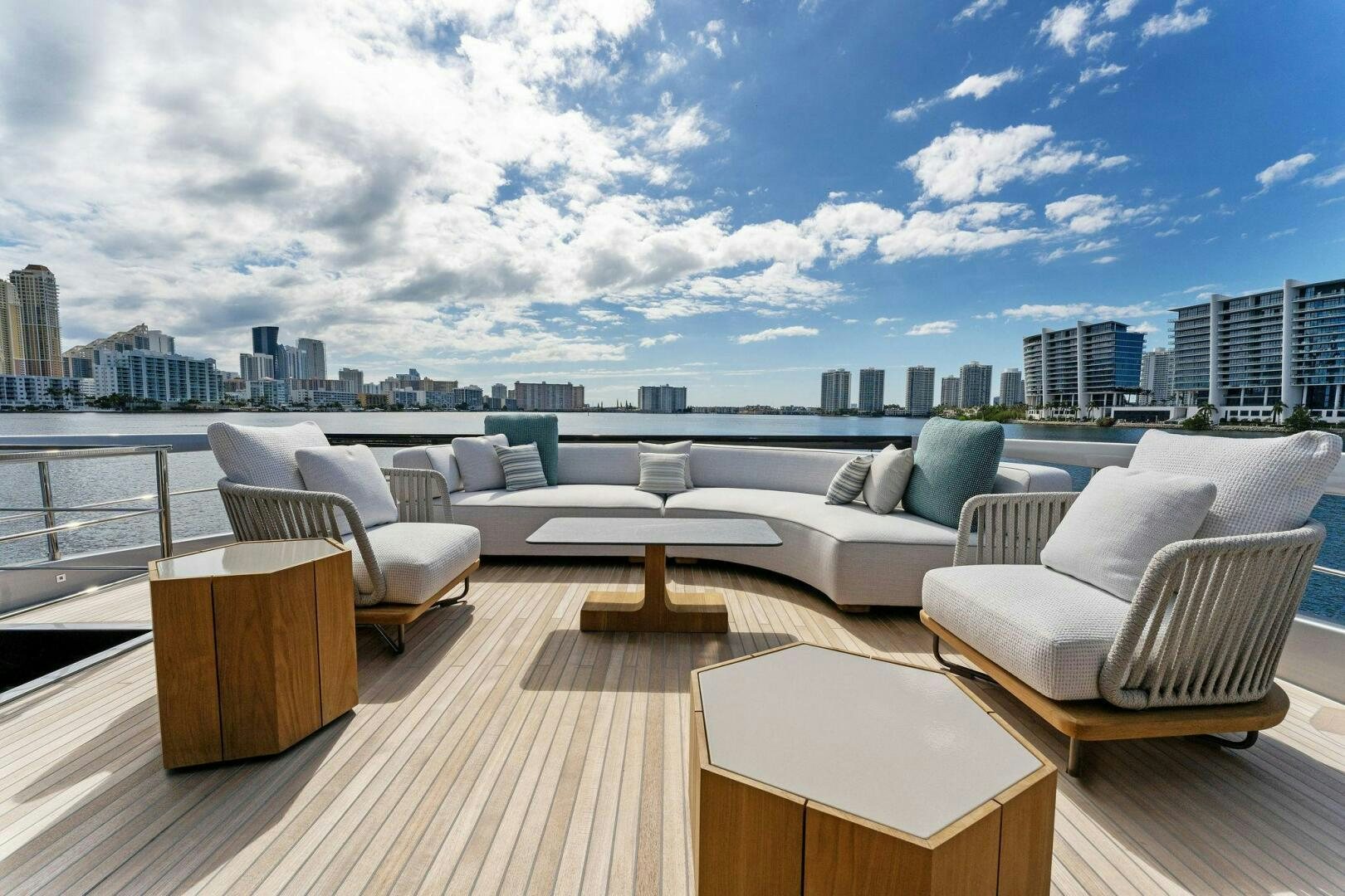 a large living room with a view of the city aboard CORSARO SUPER Yacht for Sale