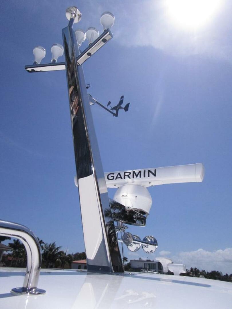 a blue sky with a satellite dish aboard NEW 70 JOHNSON Yacht for Sale