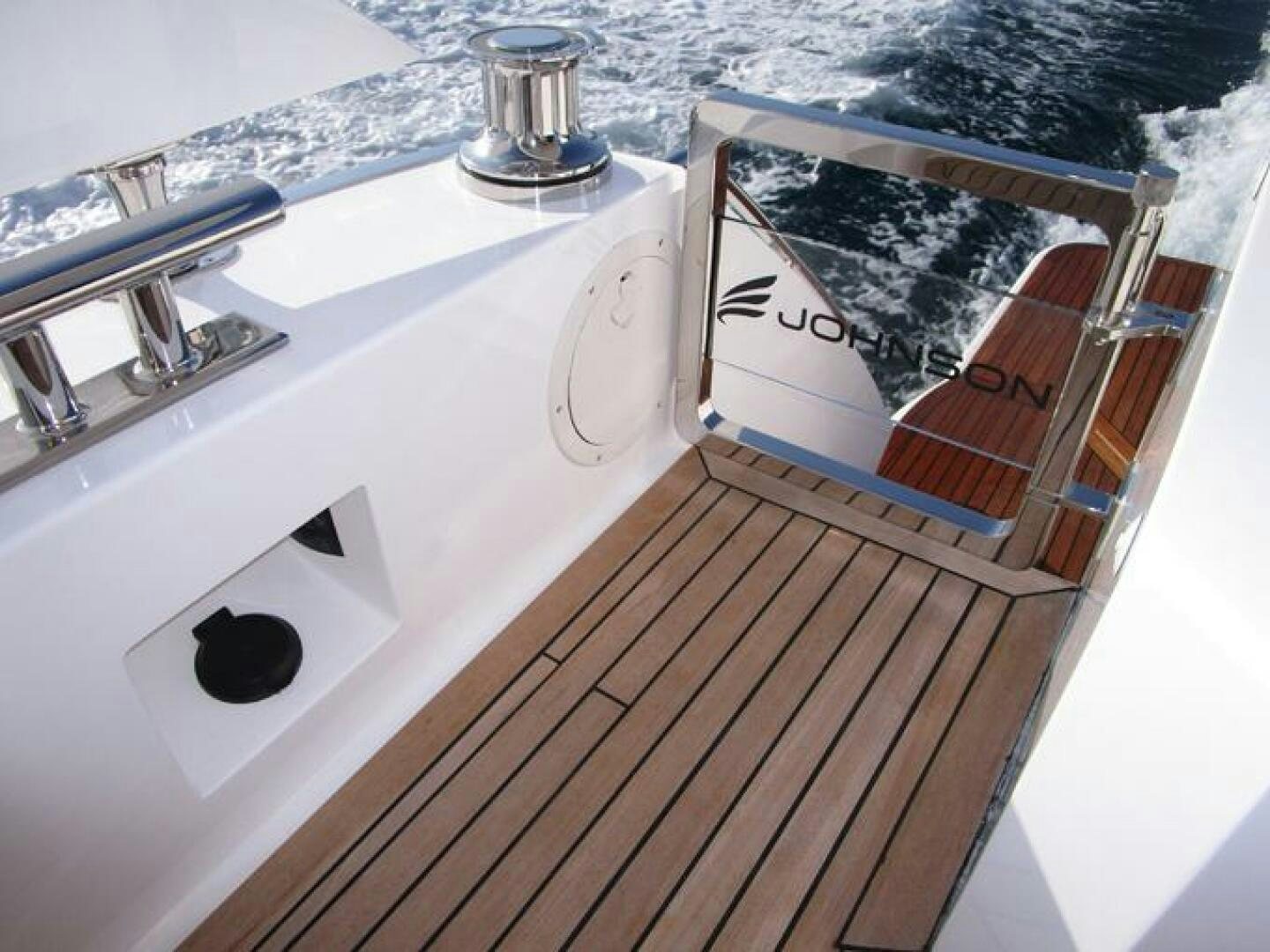 a wooden deck with a large sink aboard NEW 70 JOHNSON Yacht for Sale
