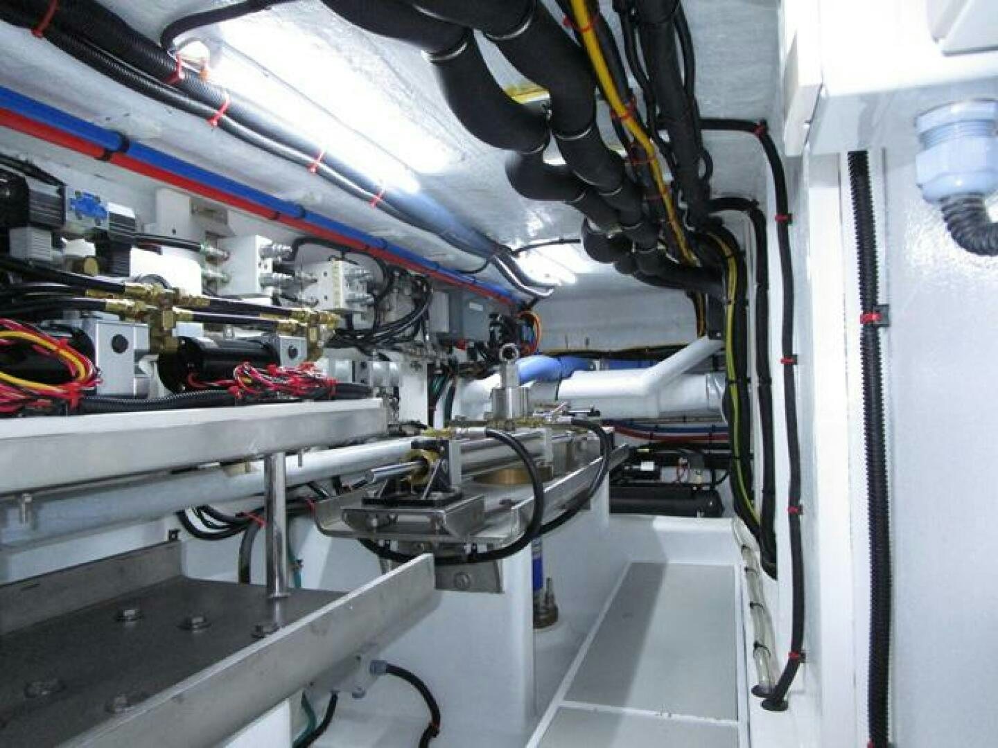 a room with several machines aboard NEW 70 JOHNSON Yacht for Sale