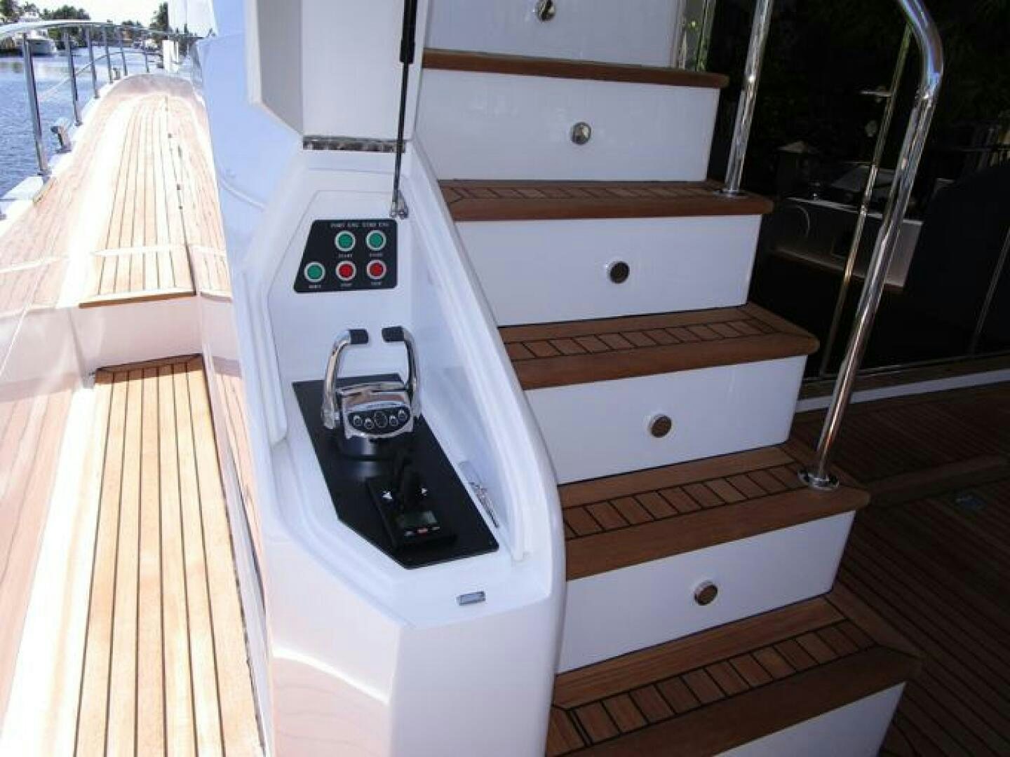 a white rectangular object with a black screen and buttons on it aboard NEW 70 JOHNSON Yacht for Sale