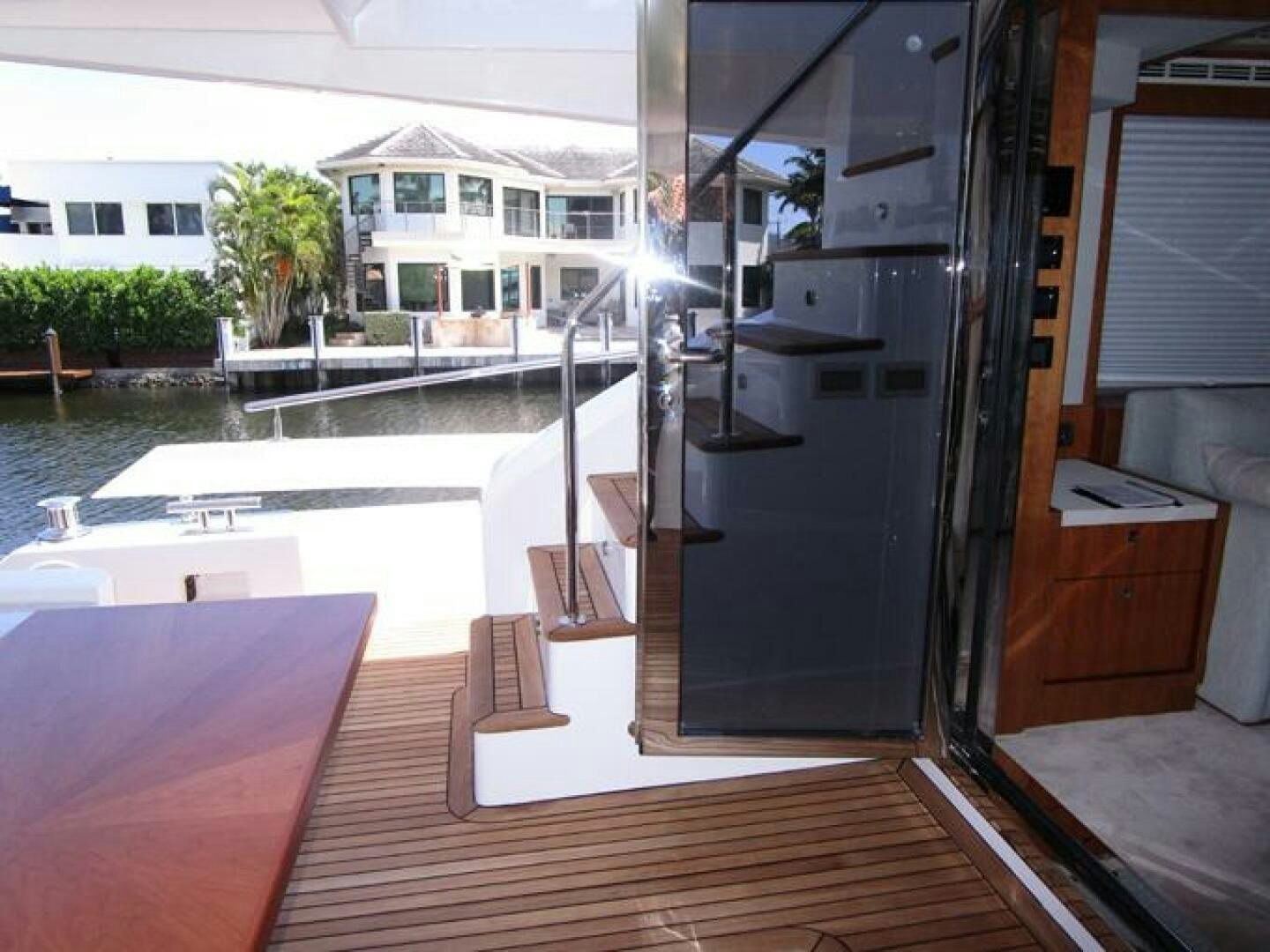a balcony with a pool aboard NEW 70 JOHNSON Yacht for Sale