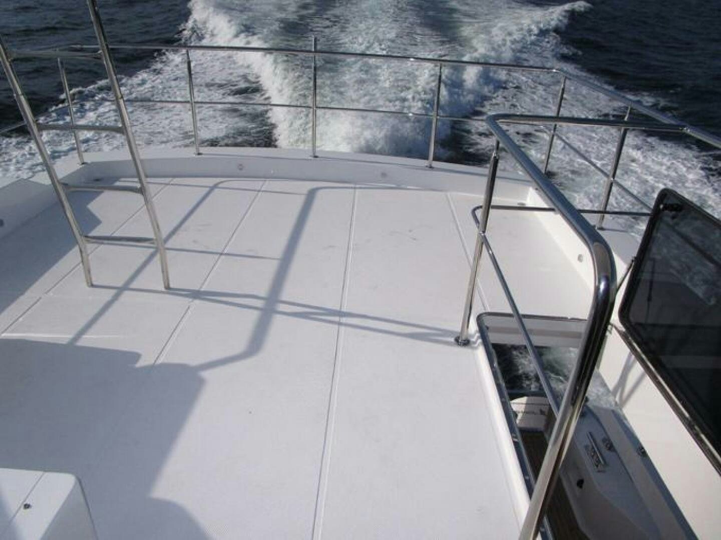 a boat on the water aboard NEW 70 JOHNSON Yacht for Sale