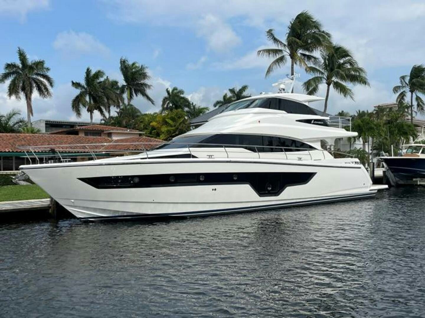 a white yacht in the water aboard NEW 70 JOHNSON Yacht for Sale
