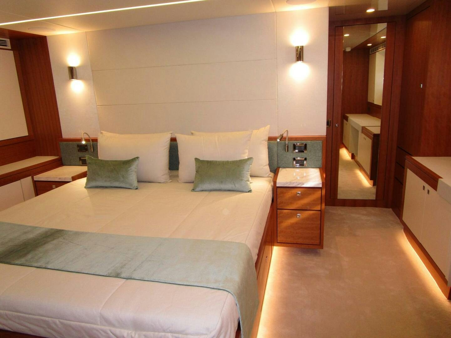 a hotel room with two beds aboard NEW 70 JOHNSON Yacht for Sale