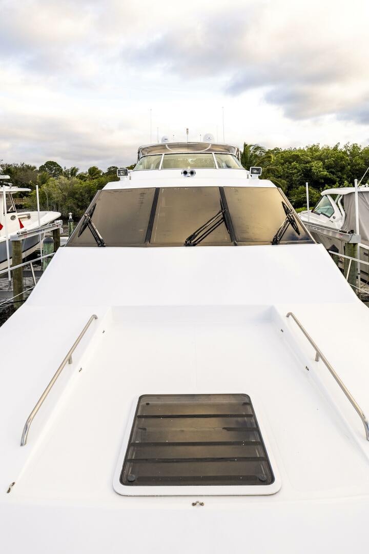 a white boat with a black railing aboard LADY LETICIA V Yacht for Sale