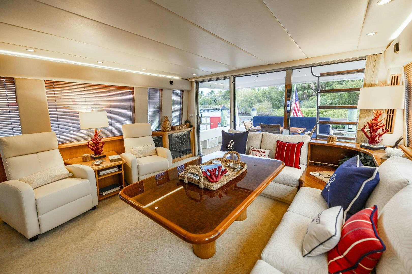 a living room with a large window aboard LADY LETICIA V Yacht for Sale