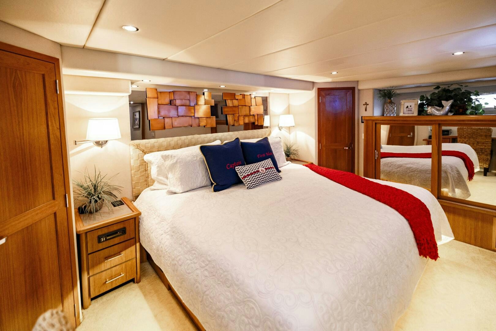 a hotel room with a large bed aboard LADY LETICIA V Yacht for Sale