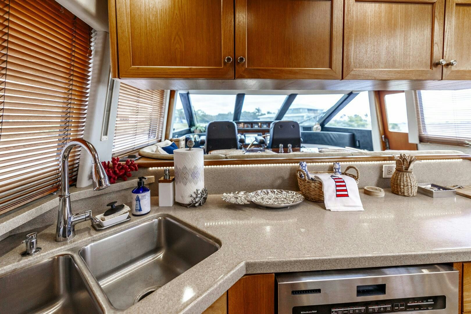 a kitchen with a sink and a microwave aboard LADY LETICIA V Yacht for Sale