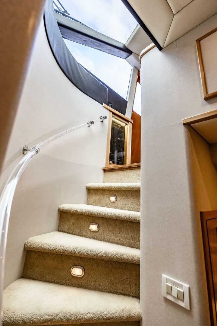 a staircase with a railing aboard LADY LETICIA V Yacht for Sale