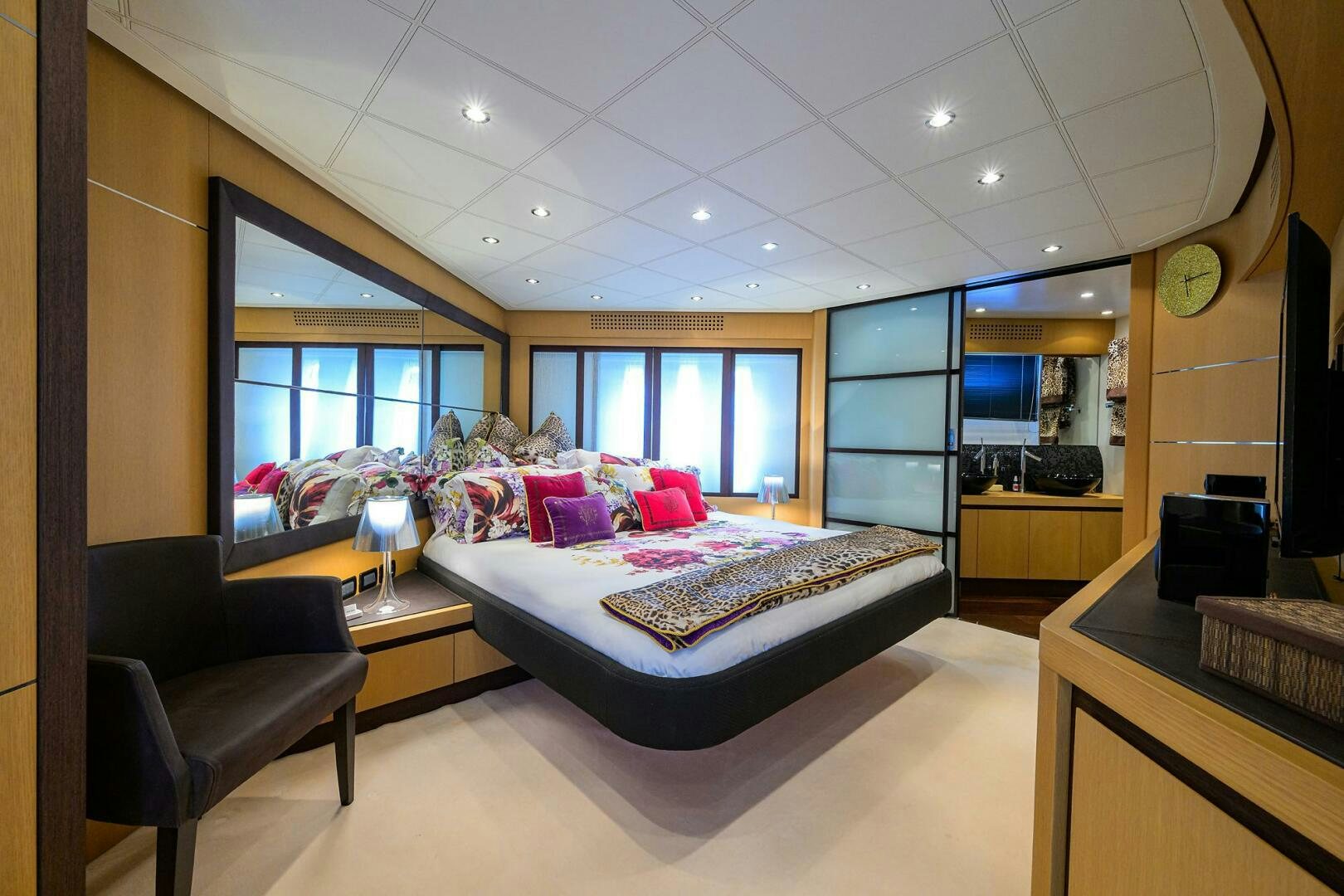 a bedroom with a large bed aboard MIURA Yacht for Sale