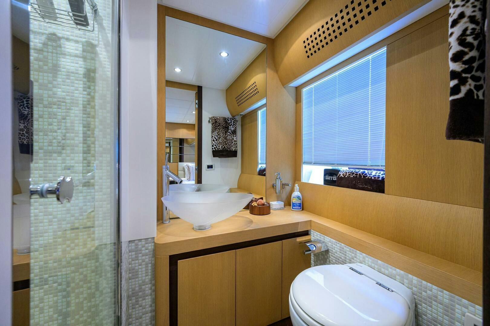 a bathroom with a sink and a toilet aboard MIURA Yacht for Sale