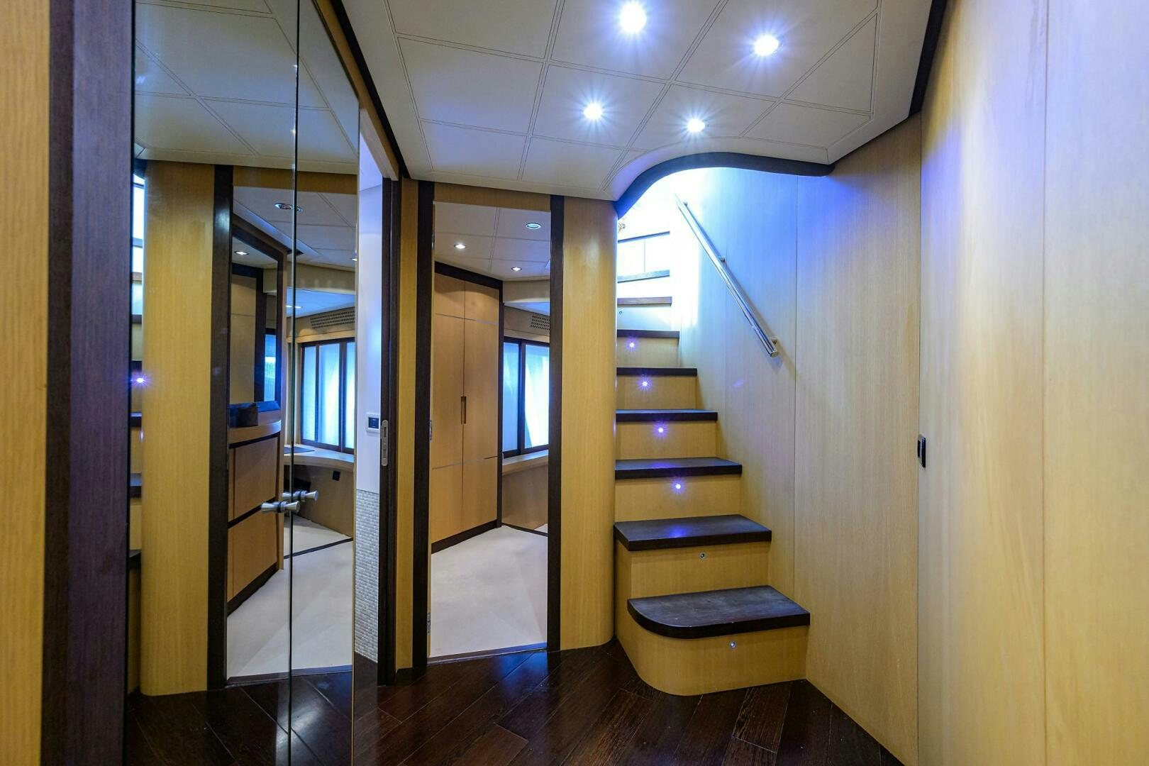 a bathroom with a wood floor aboard MIURA Yacht for Sale