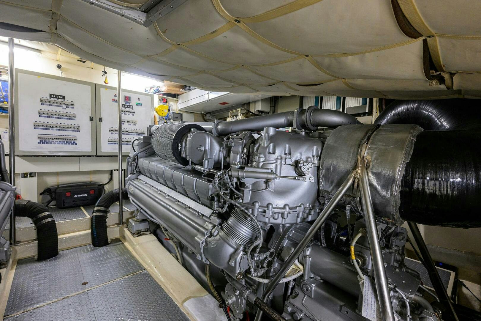a car with a hood aboard MIURA Yacht for Sale