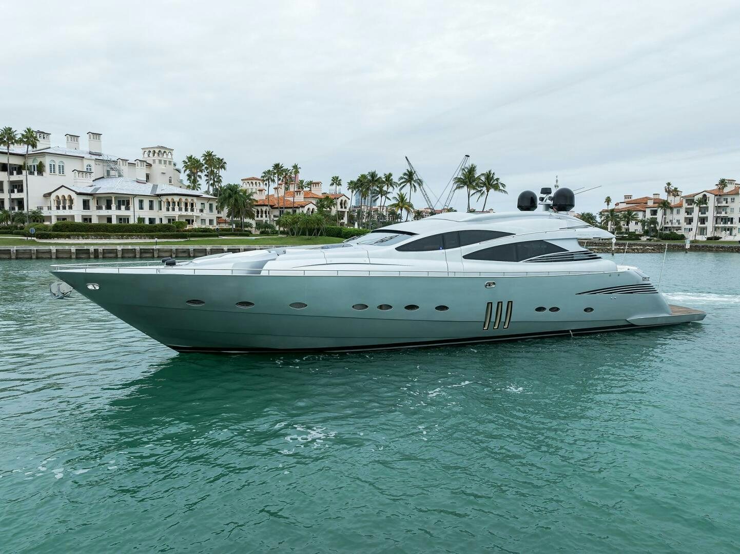a white yacht in the water aboard MIURA Yacht for Sale