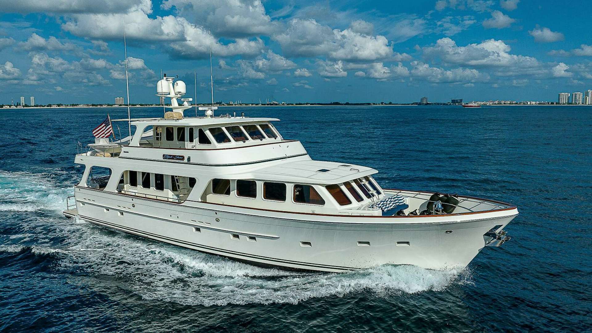 a large white boat in the water aboard ELIJAH JANE Yacht for Sale