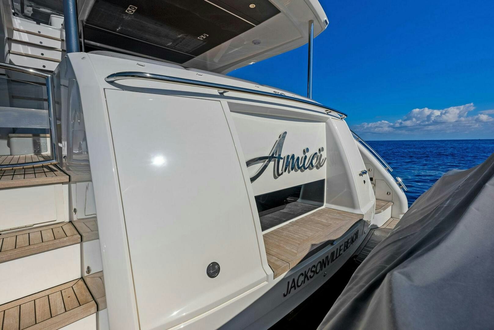 a white boat on a boat aboard AMICI Yacht for Sale