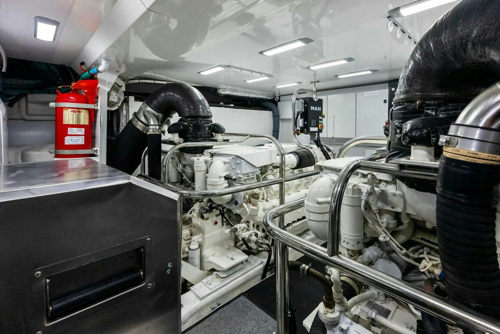 a machine in a factory aboard AMICI Yacht for Sale
