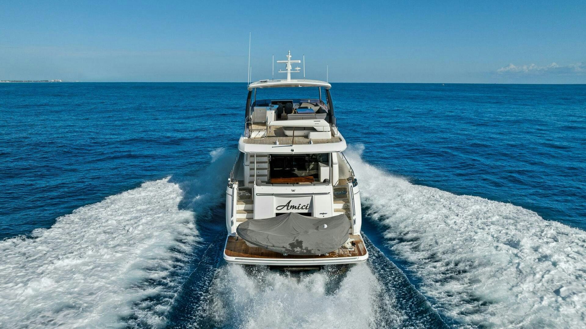 a boat on the water aboard AMICI Yacht for Sale