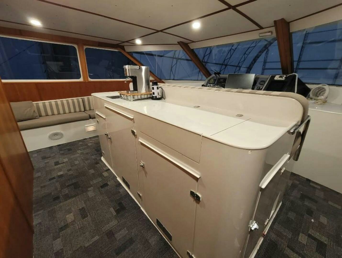 a kitchen with a large white counter aboard GOLDEN EAGLE Yacht for Sale
