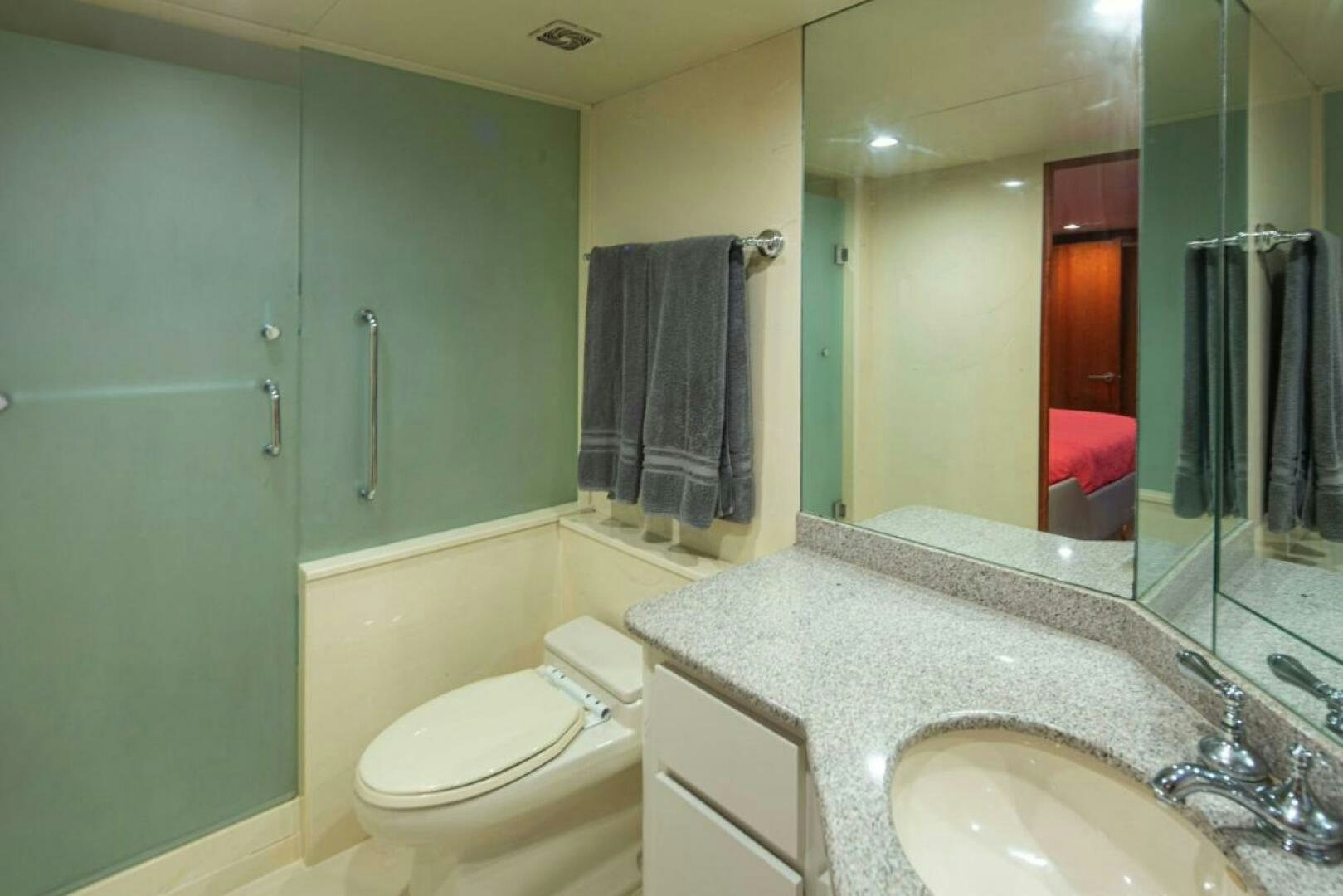 a bathroom with a large mirror aboard GOLDEN EAGLE Yacht for Sale