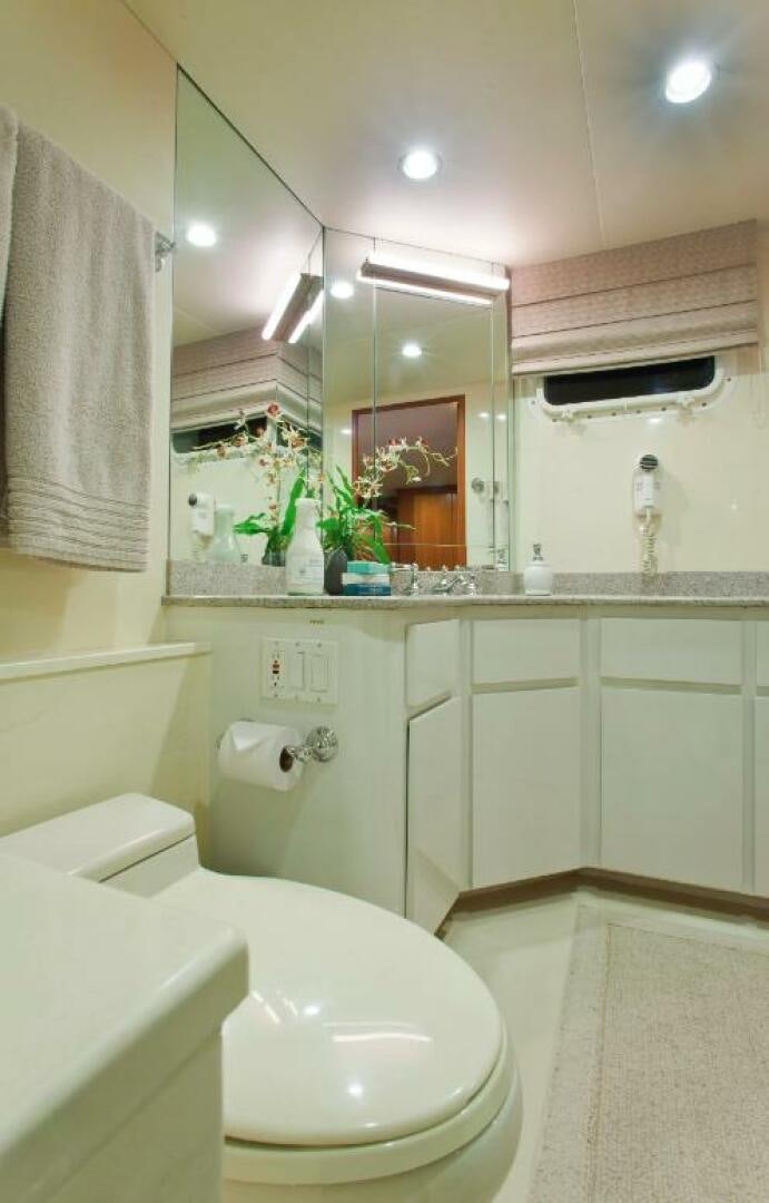 a bathroom with a sink and a toilet aboard GOLDEN EAGLE Yacht for Sale