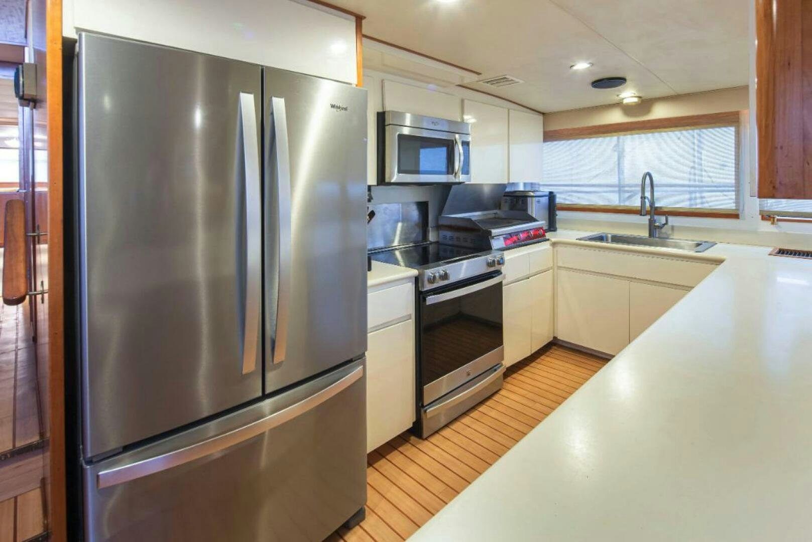 a kitchen with stainless steel appliances aboard GOLDEN EAGLE Yacht for Sale