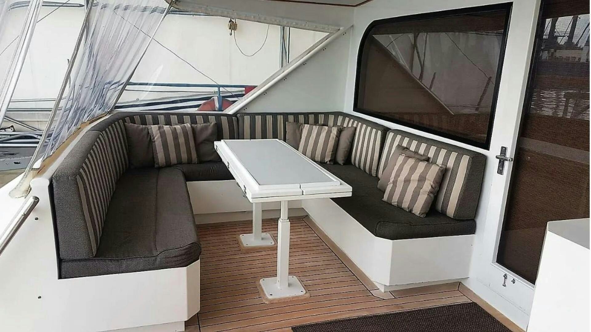 a white coffee table in a room aboard GOLDEN EAGLE Yacht for Sale