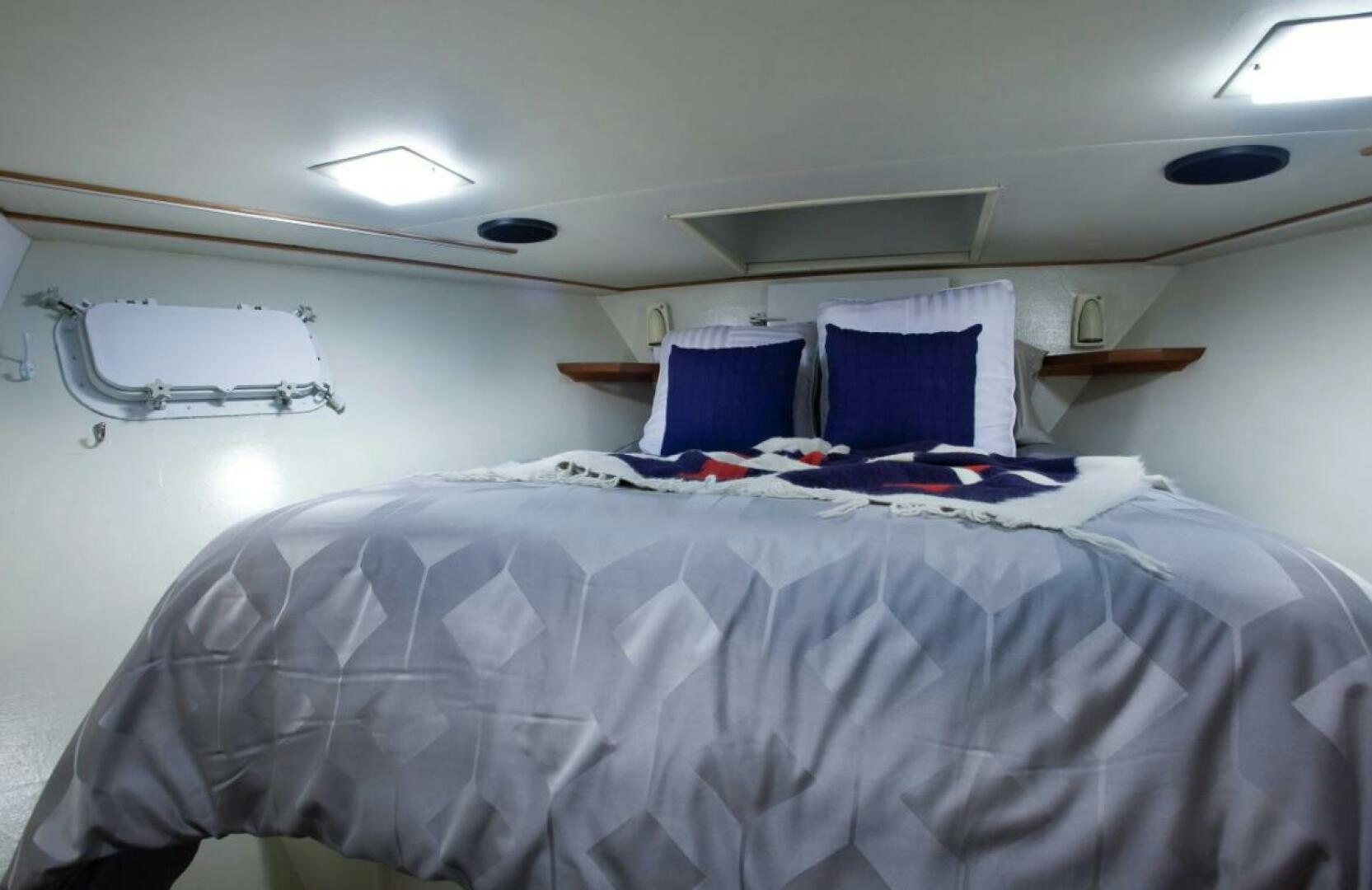 a bed with white sheets aboard GOLDEN EAGLE Yacht for Sale