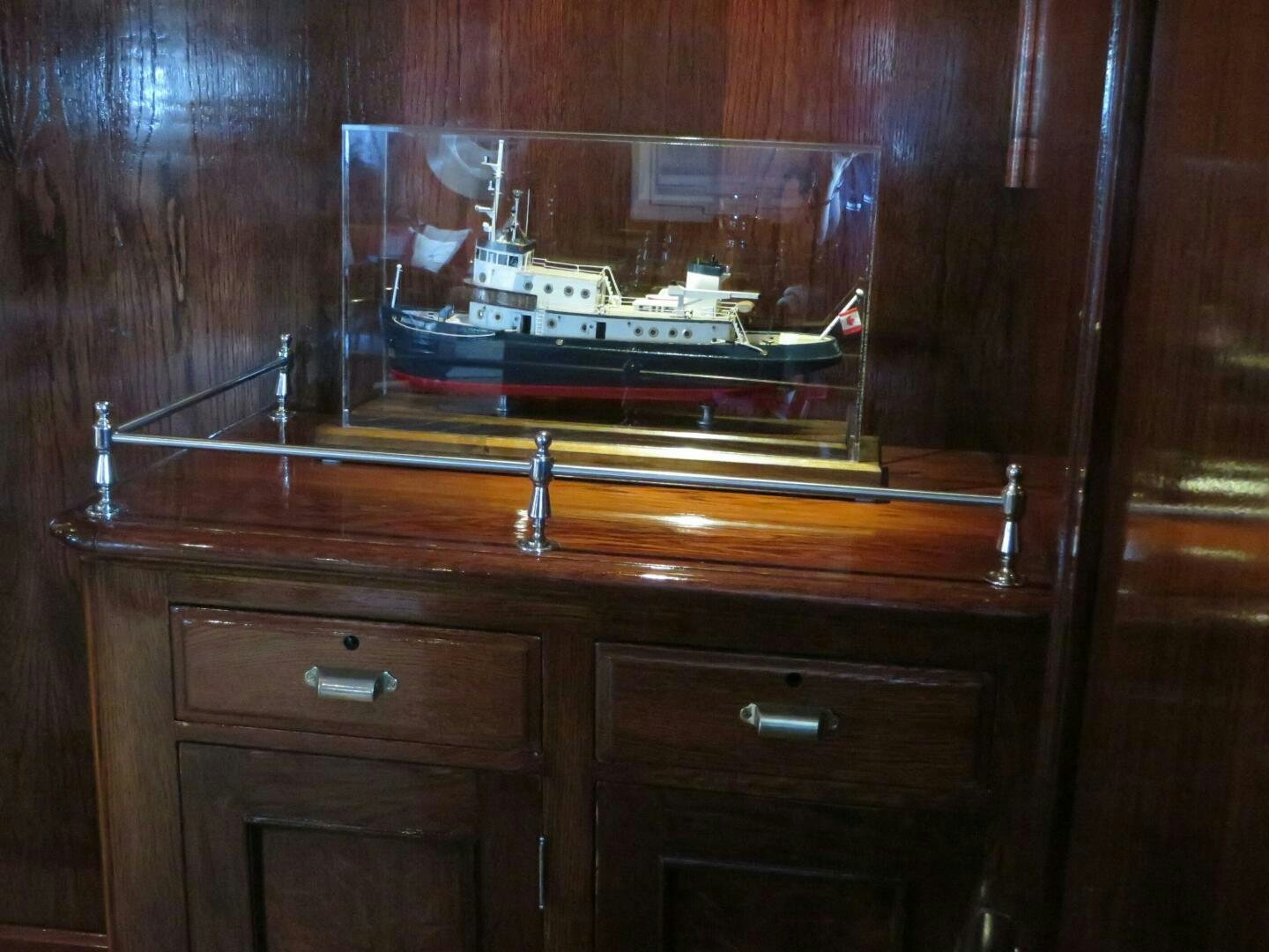 a television on a cabinet aboard PRESCOTONT Yacht for Sale