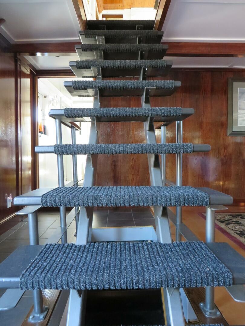 a chair with a blue cloth aboard PRESCOTONT Yacht for Sale