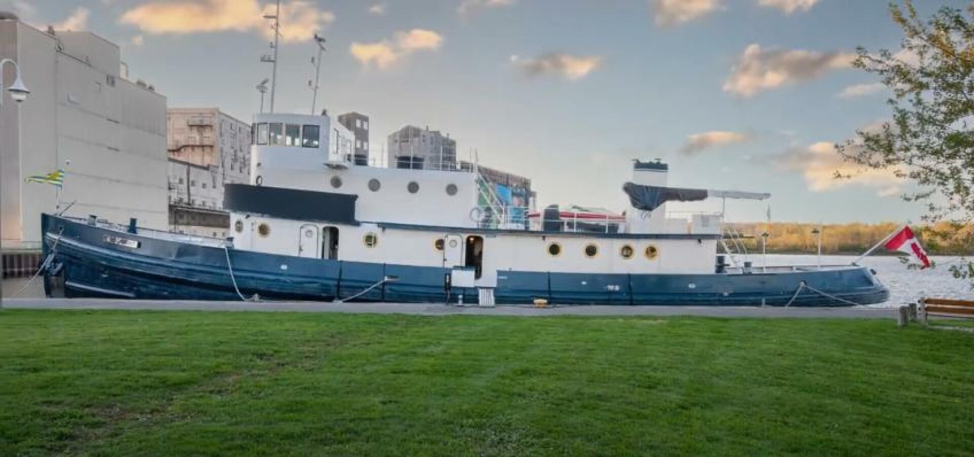 a large ship in a body of water aboard PRESCOTONT Yacht for Sale