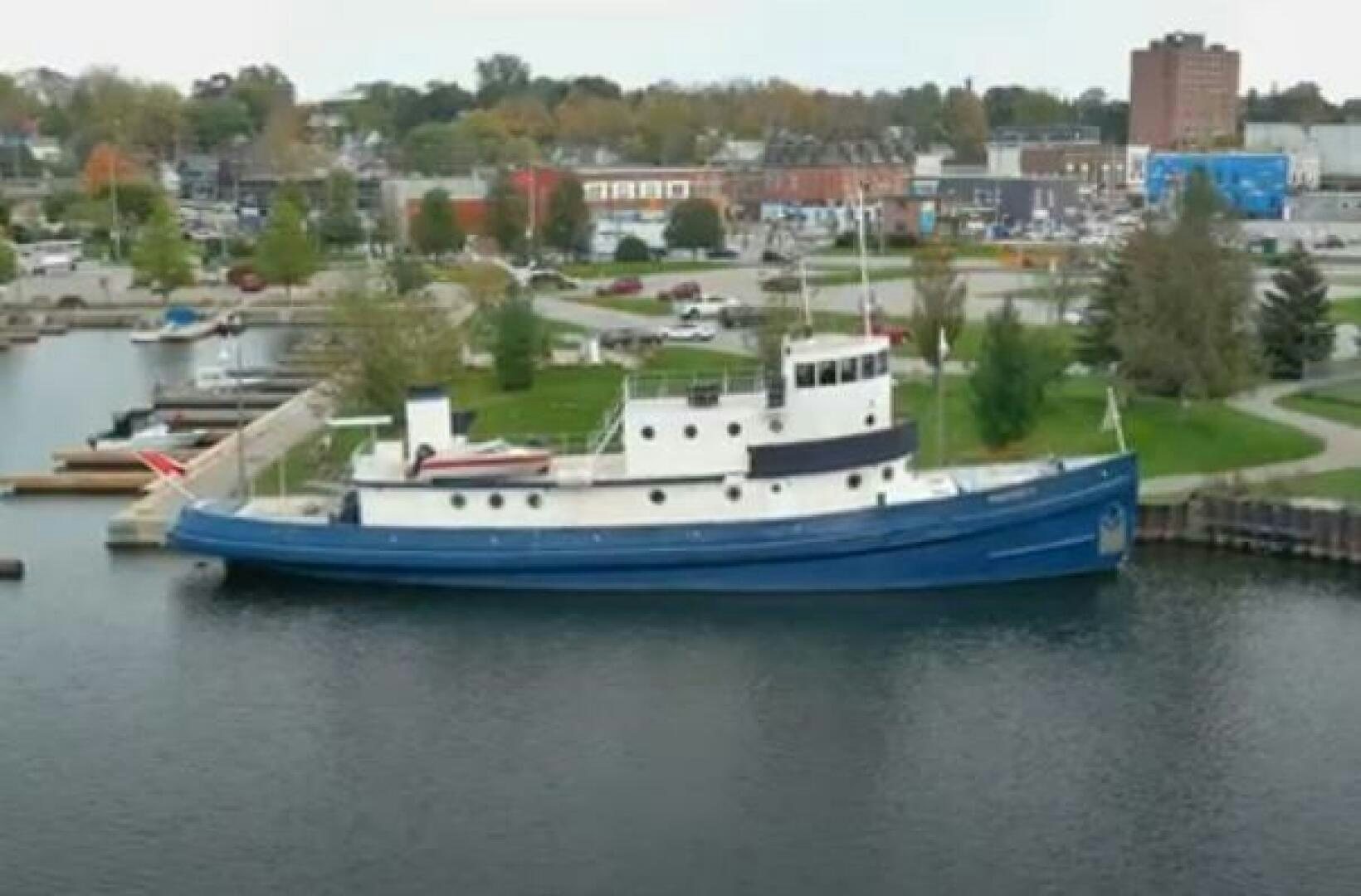 a large boat in a harbor aboard PRESCOTONT Yacht for Sale