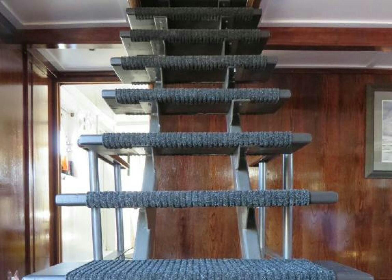 a set of stairs in a building aboard PRESCOTONT Yacht for Sale