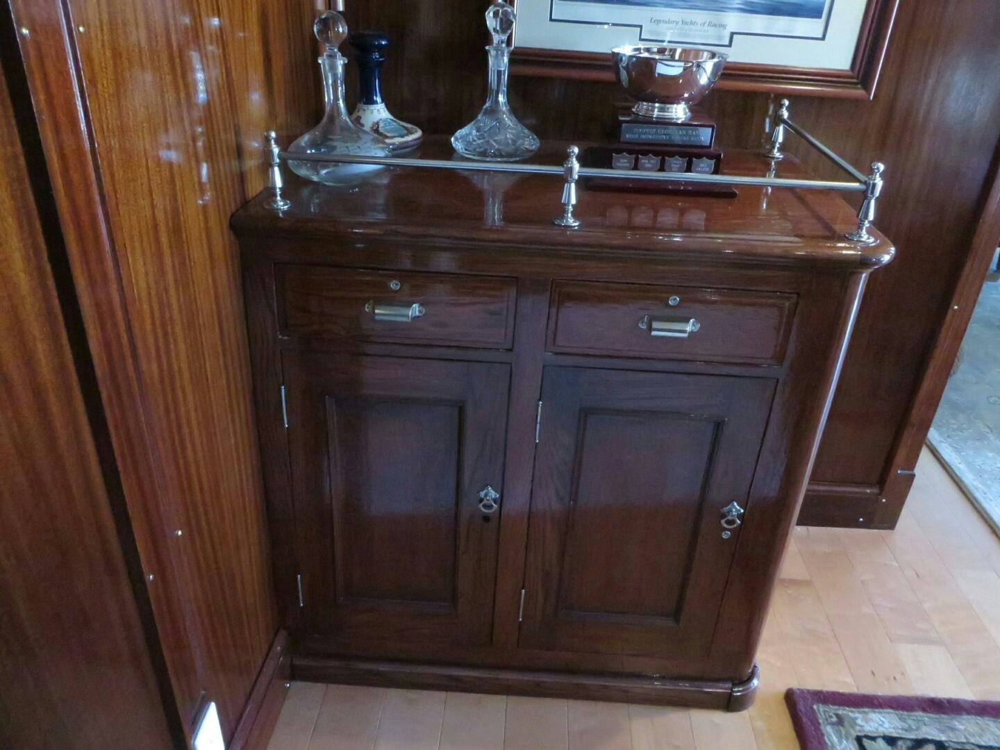 a wooden cabinet with a shelf aboard PRESCOTONT Yacht for Sale