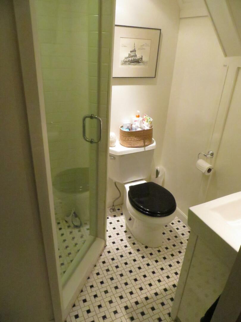 a bathroom with a toilet and a sink aboard PRESCOTONT Yacht for Sale