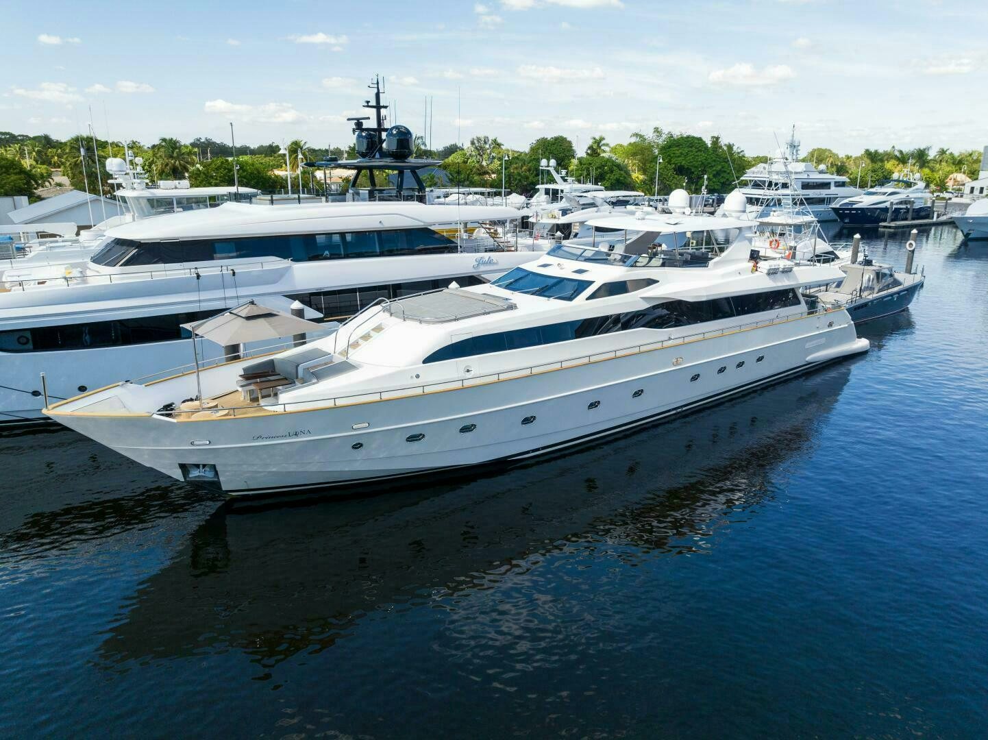 a group of boats in a harbor aboard PRINCESS LONA Yacht for Sale