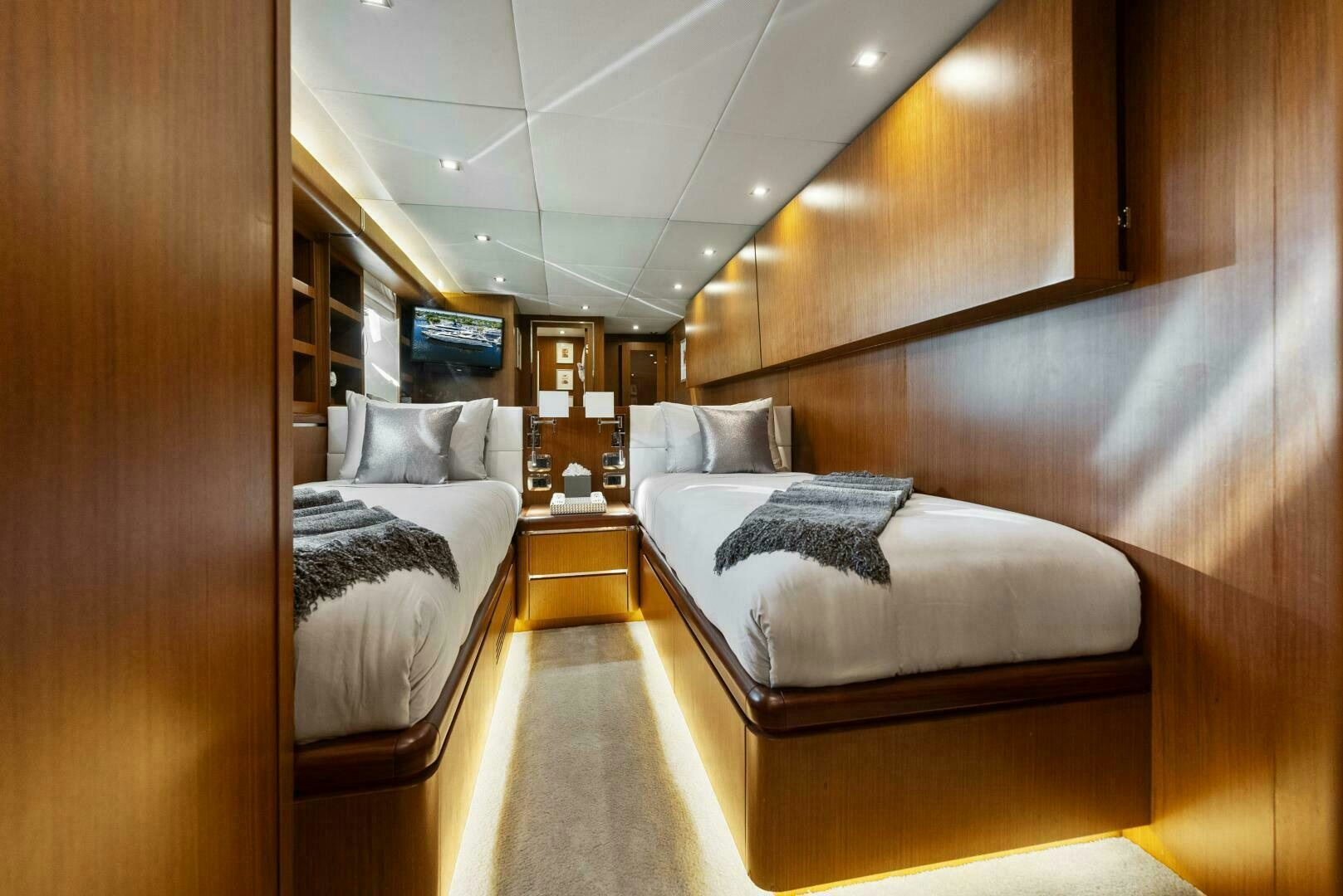 a room with a bed and a couch aboard PRINCESS LONA Yacht for Sale