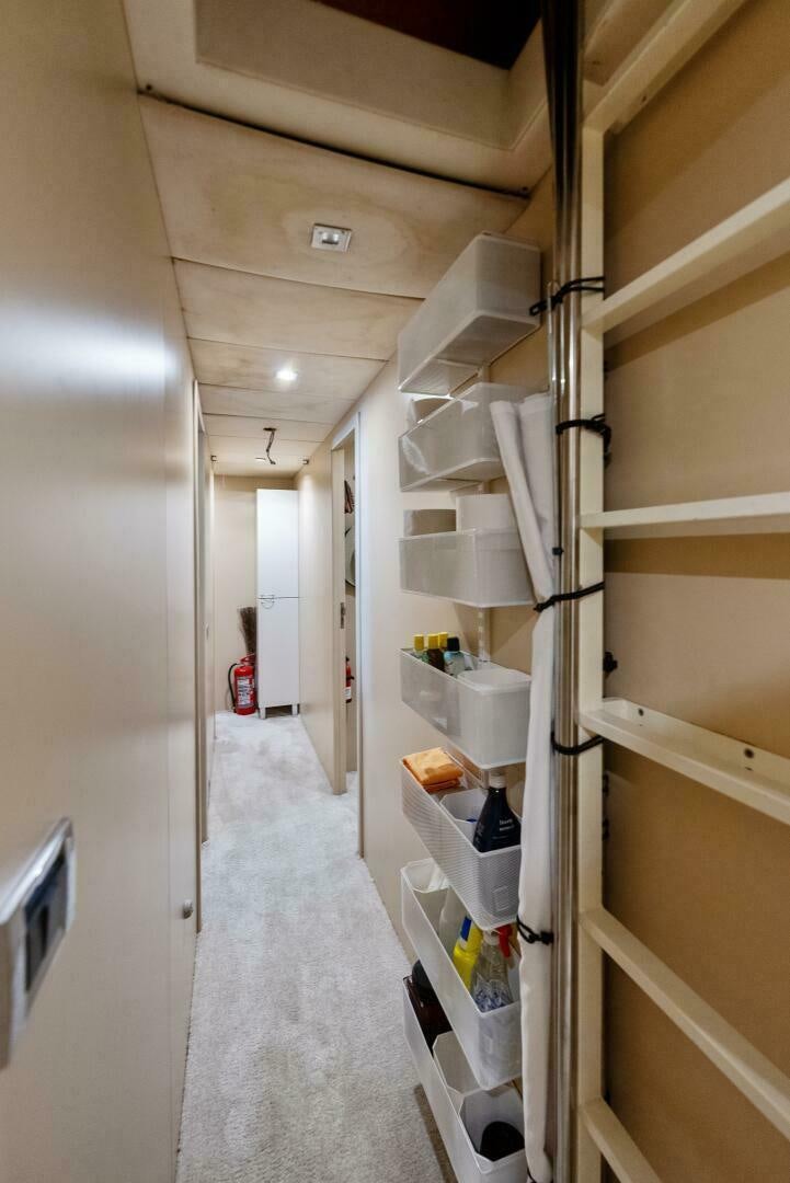 a room with shelves and shelves aboard PRINCESS LONA Yacht for Sale