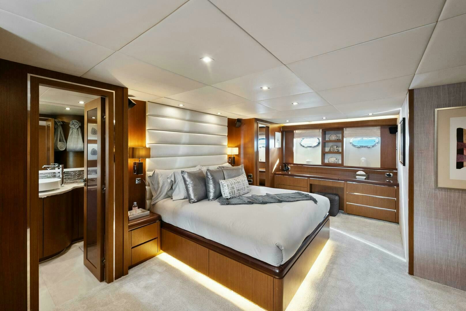 a large bedroom with a large bed aboard PRINCESS LONA Yacht for Sale
