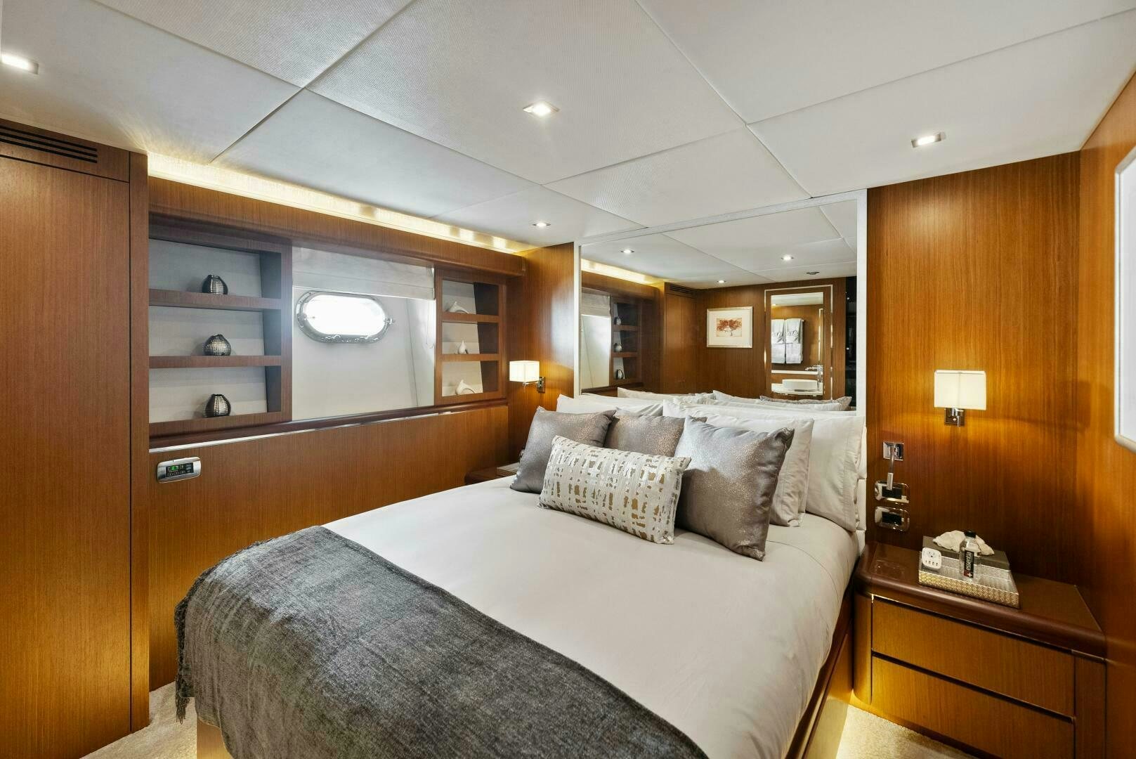 a large bed in a hotel room aboard PRINCESS LONA Yacht for Sale