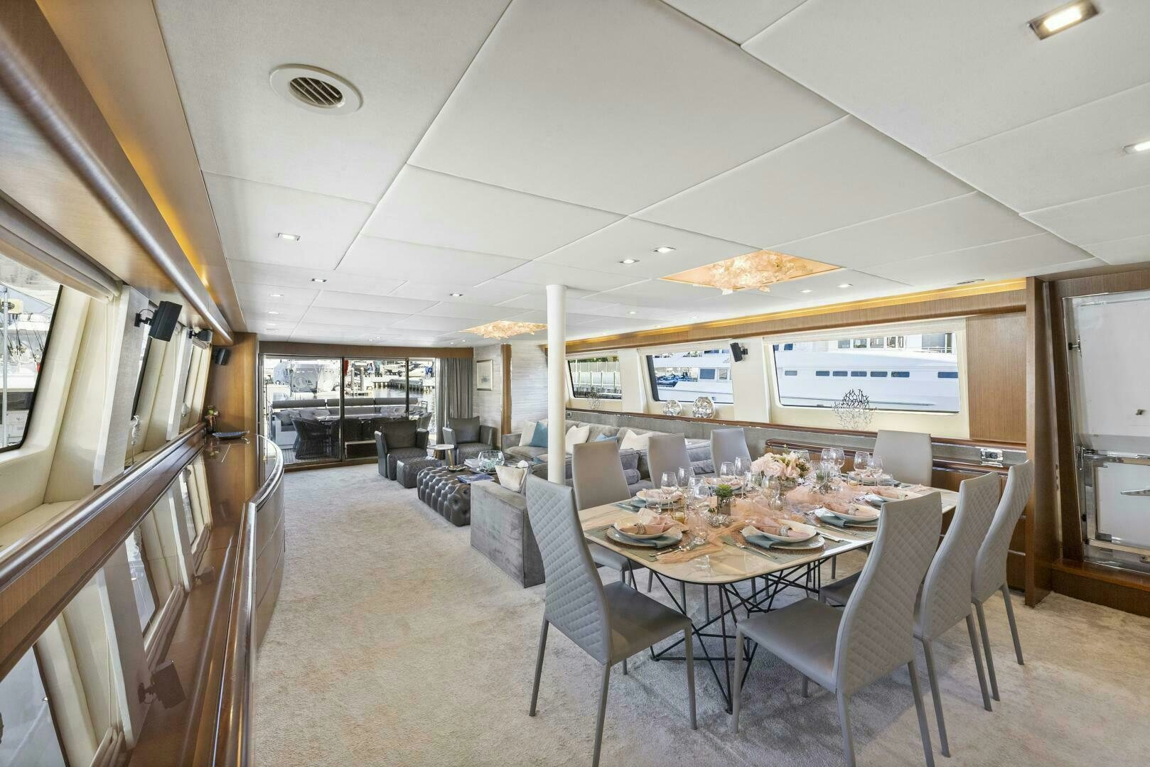a dining room with a table and chairs aboard PRINCESS LONA Yacht for Sale