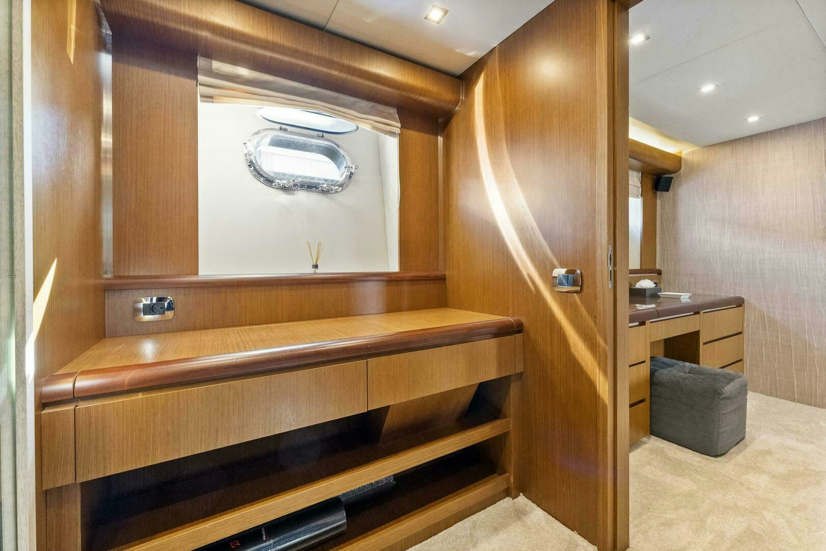 a room with wooden cabinets aboard PRINCESS LONA Yacht for Sale