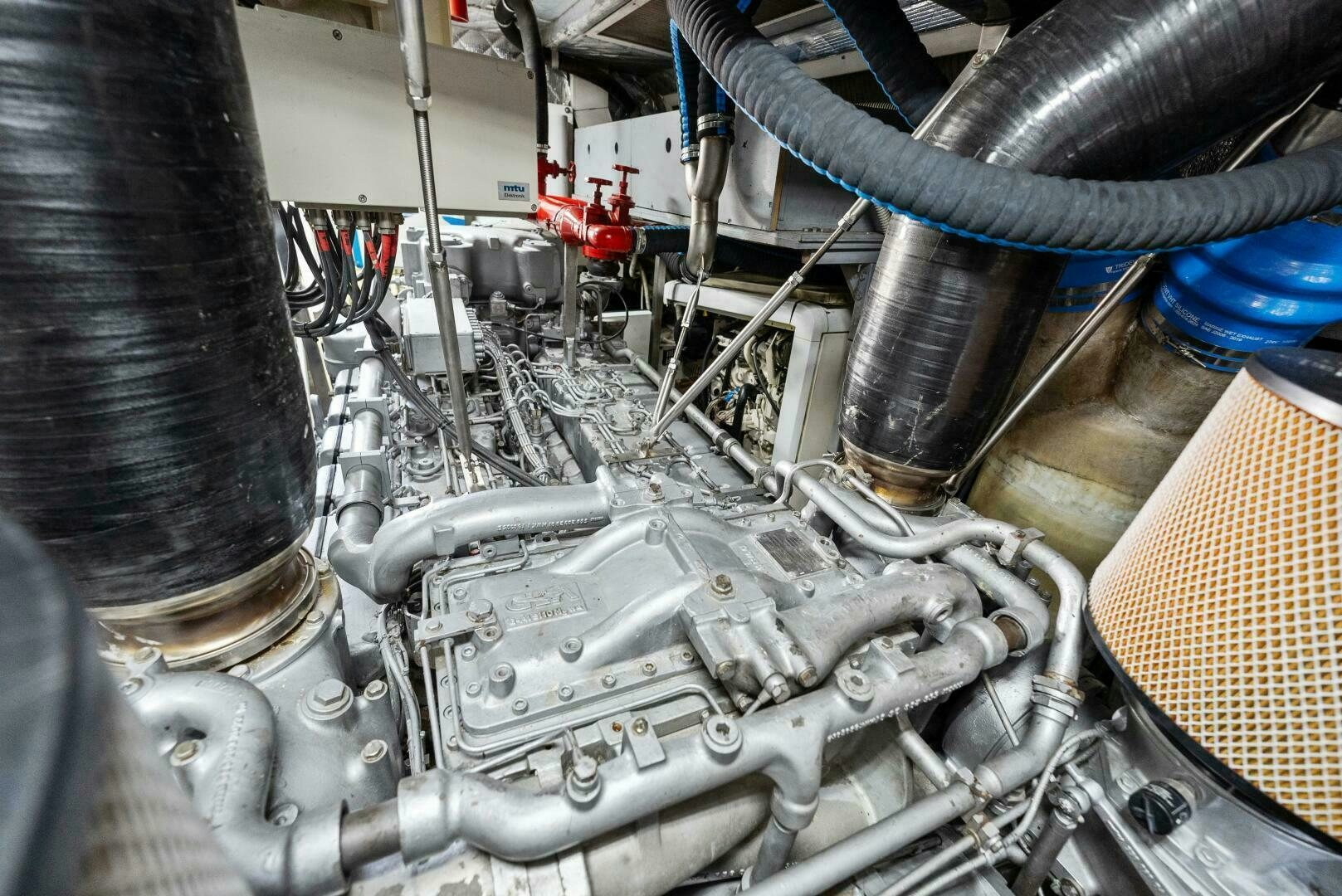 a close-up of a car engine aboard PRINCESS LONA Yacht for Sale