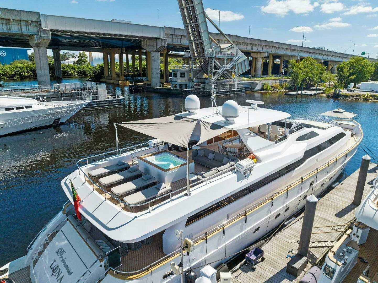a boat docked at a pier aboard PRINCESS LONA Yacht for Sale