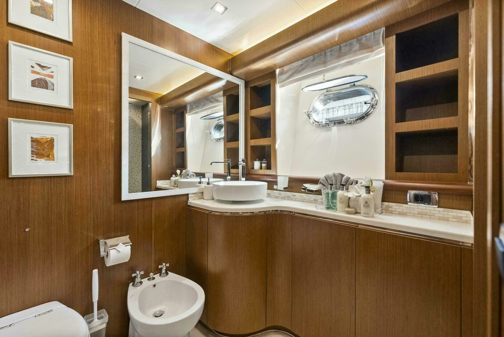 a bathroom with a sink and a mirror aboard PRINCESS LONA Yacht for Sale