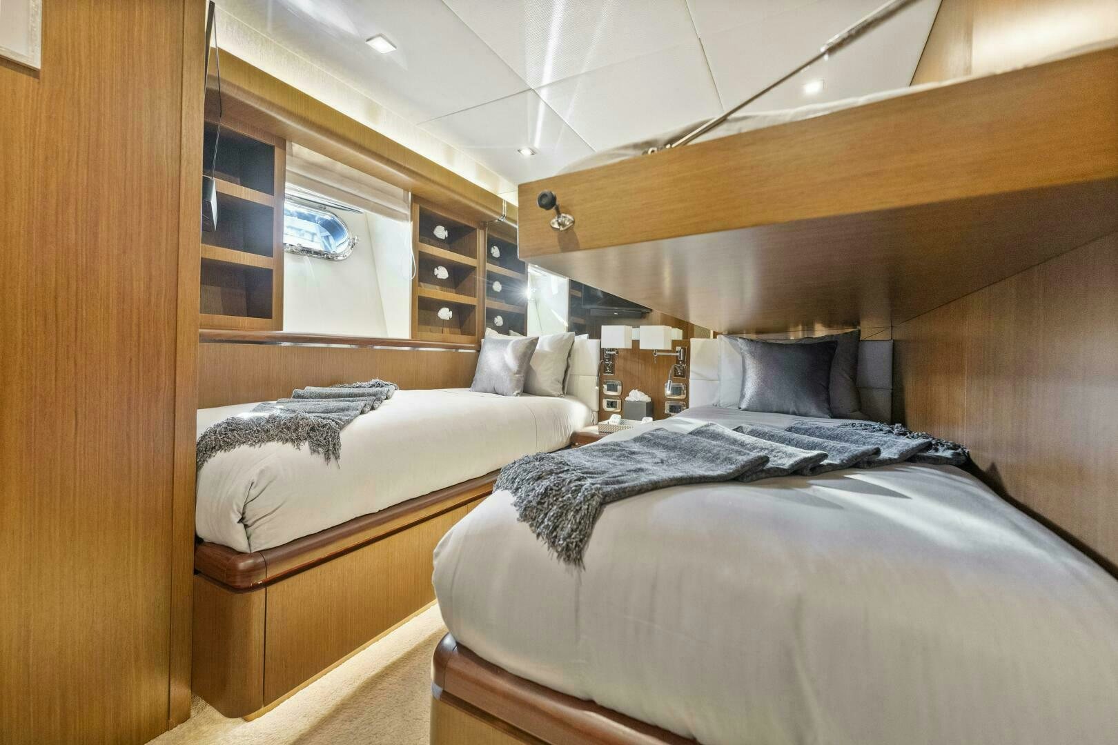 a room with two beds aboard PRINCESS LONA Yacht for Sale